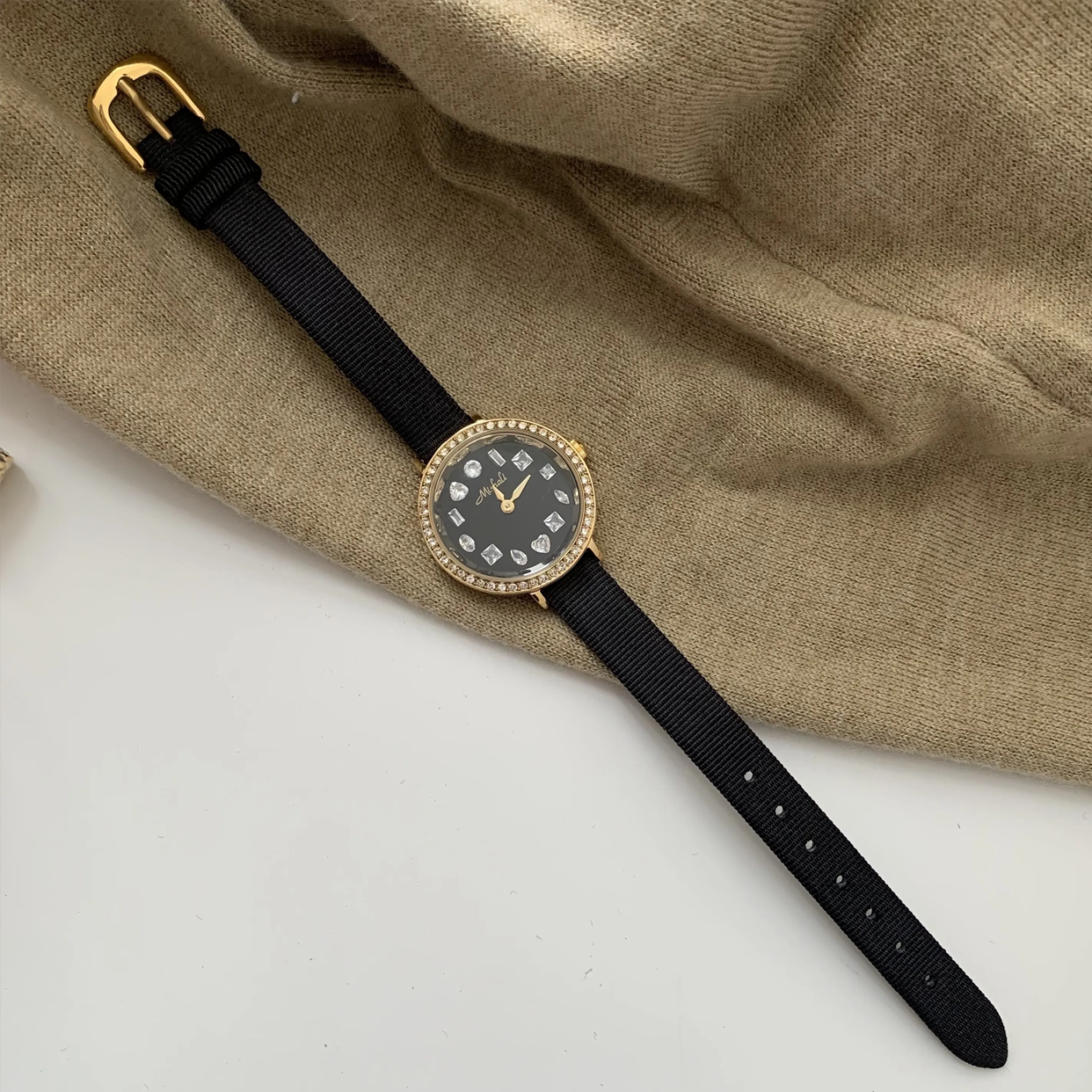 Radiant Noir Timepiece: Gold and Black Diamond-Accented Watch