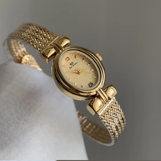 Golden Sheaf Timepiece: Oval Quartz Watch