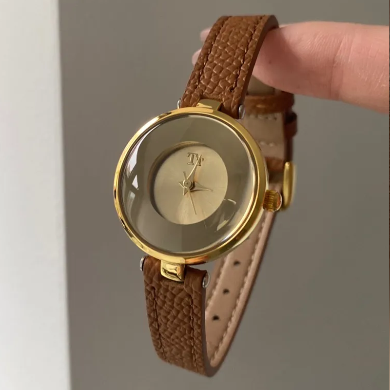 Amber Glow Timepiece: Brown Leather & Glass Dial Watch