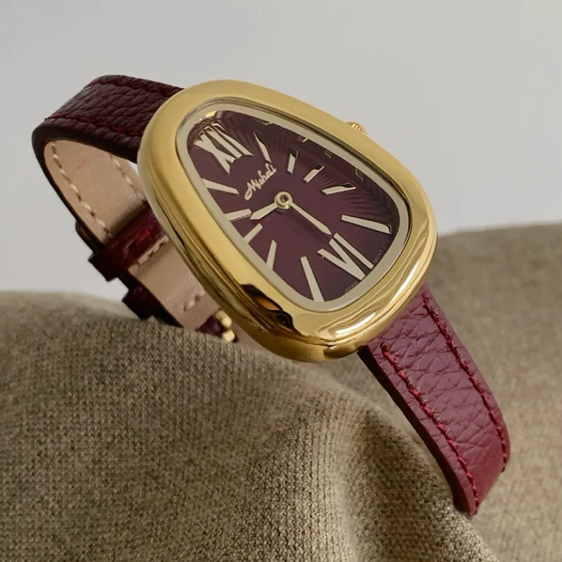 Crimson Elegance Timepiece: Gold and Burgundy Watch