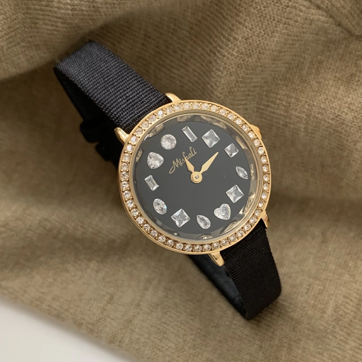 Radiant Noir Timepiece: Gold and Black Diamond-Accented Watch