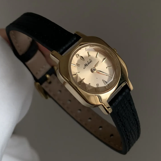 Onyx Luxe Timepiece: Black and Gold Leather Quartz Watch