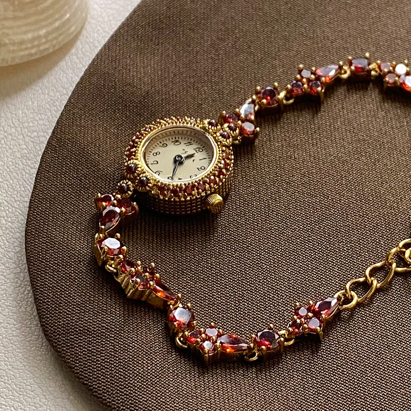 Garnet Grace Timepiece: Petite Watch with Ruby Accents