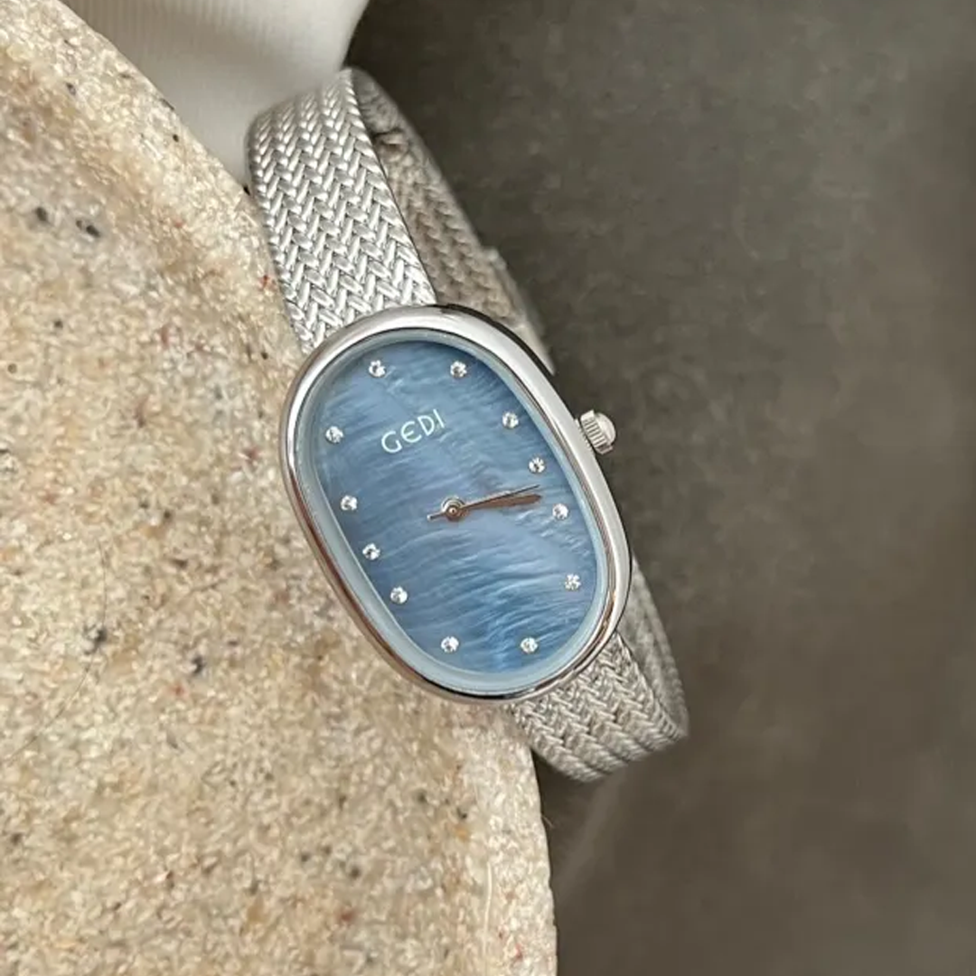 Azure Radiance Timepiece: Silver and Sky Blue Watch